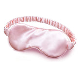masque de sommeil en soie rose tendre